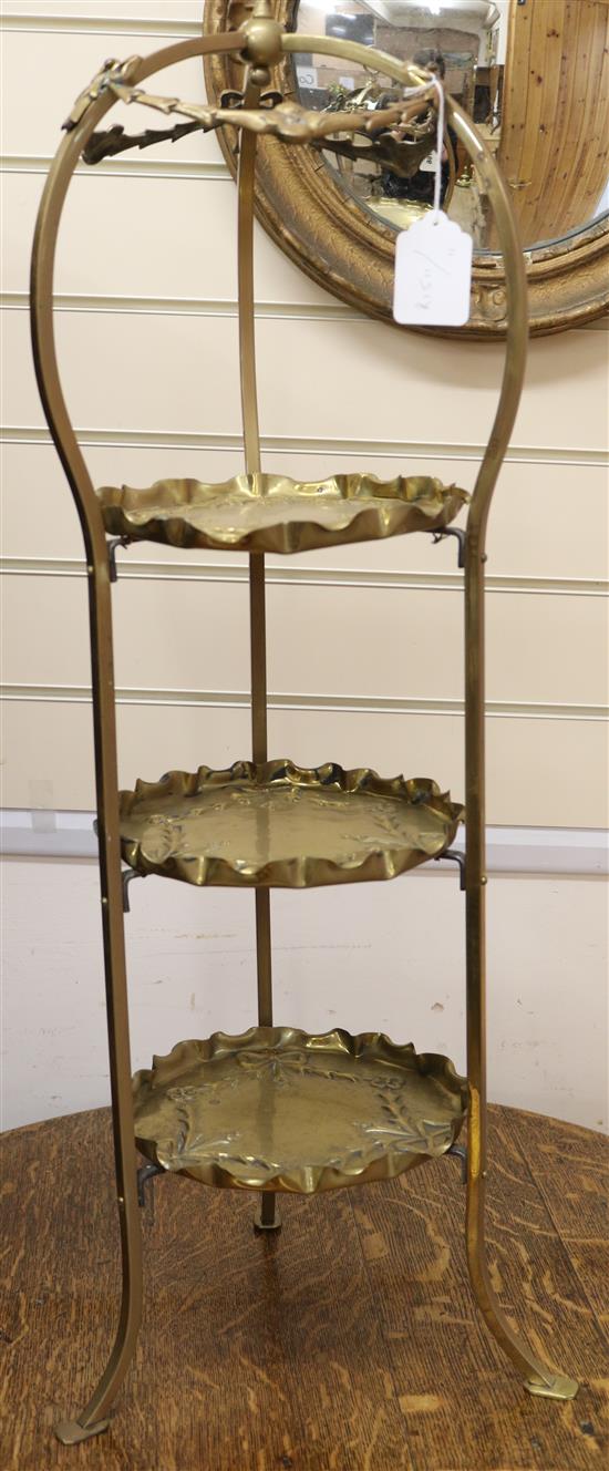 A brass cake stand, 85cm high